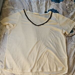 Elegant Cream Top with Black Trim